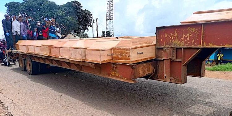 Mass Burial Held for Victims of Plateau Massacre