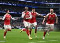Arsenal F.C. thrash Tottenham Hotspur F.C. 4–1 to revive title charge